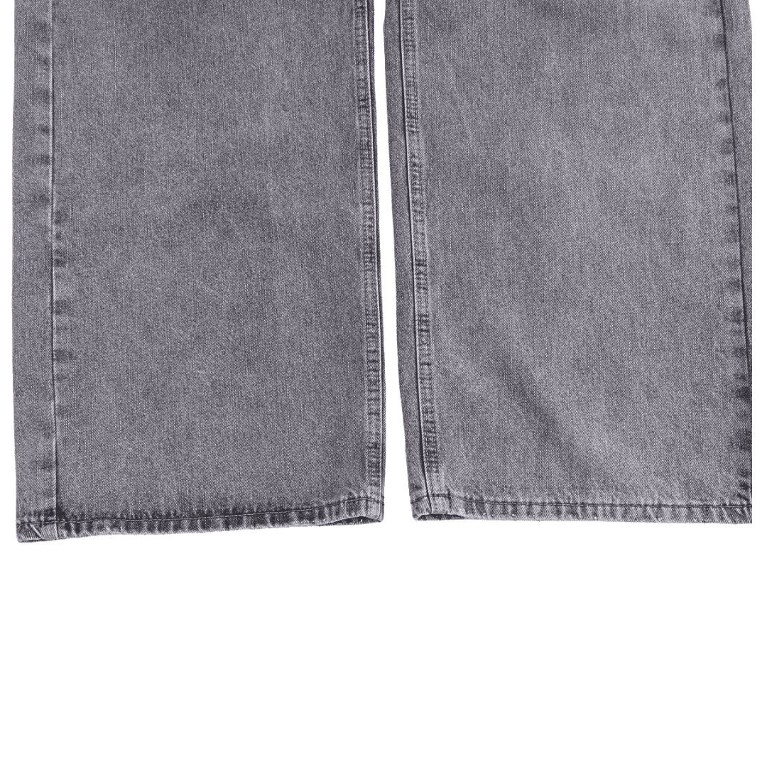 Asymmetrische Jeans mit gekreuztem Bund und weitem Bein